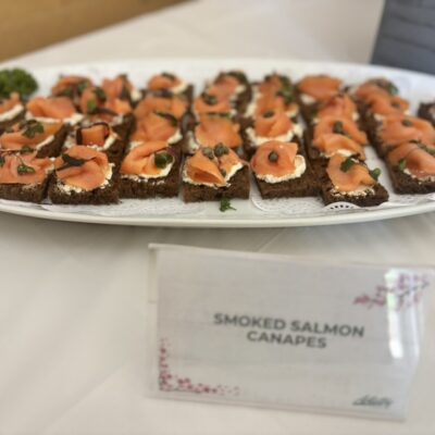 Platter of smoked salmon on pumpernickel bread