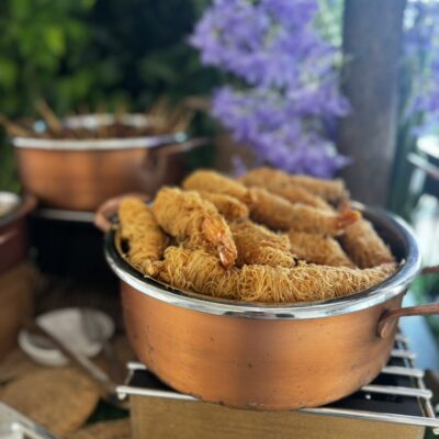 Cooper pot filled with crispy dubai shrimp